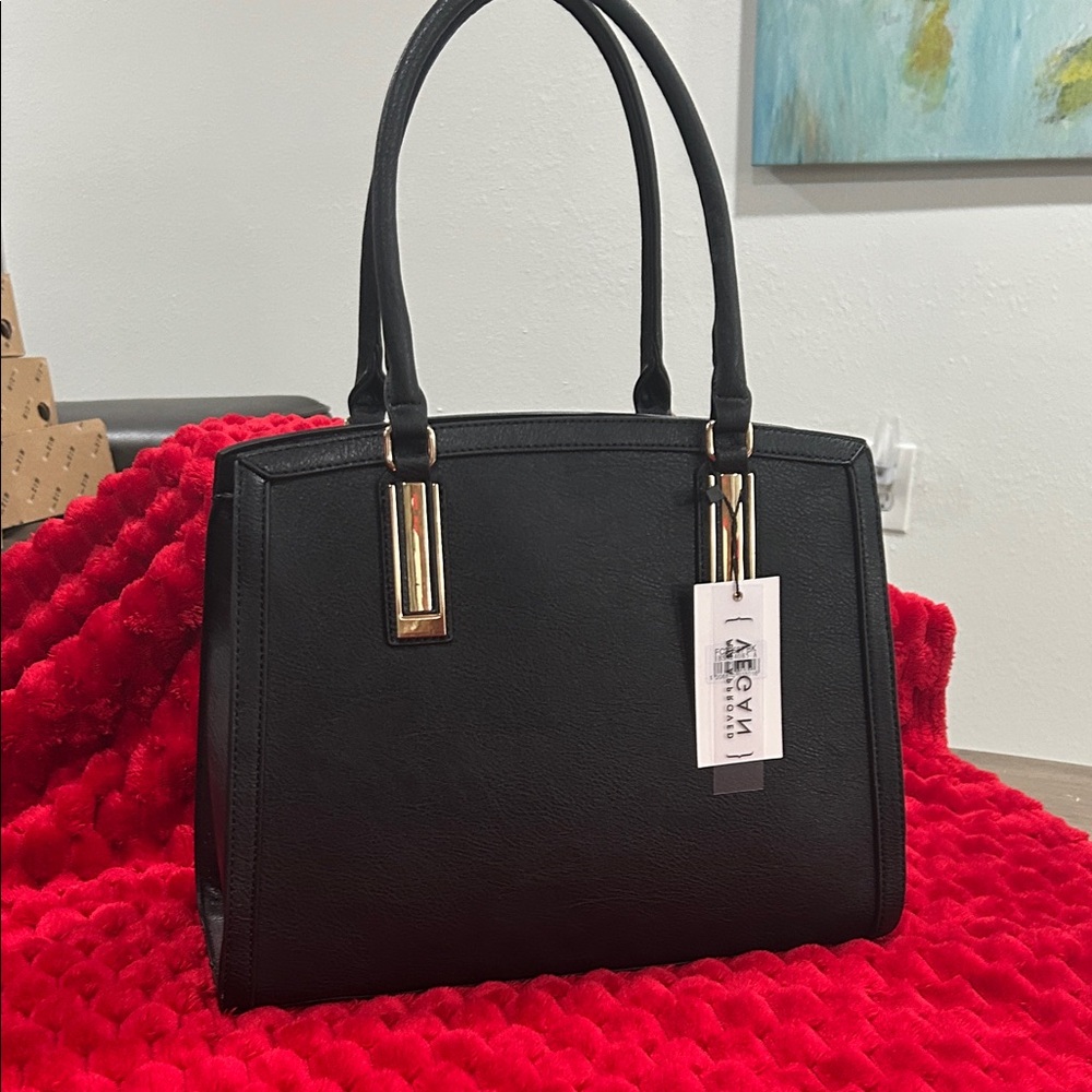 Classic Black Satchel with Gold Accents. New never used..